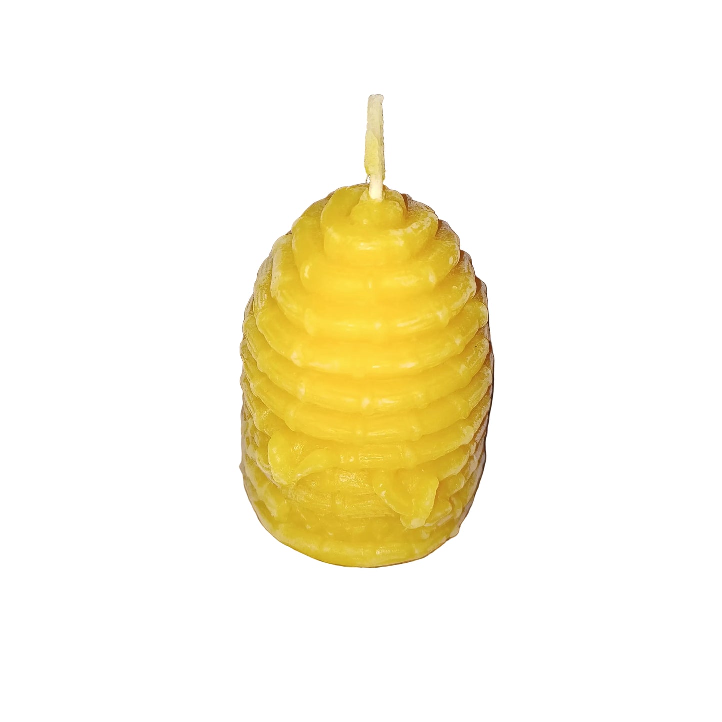 Beehive-shaped beeswax candle